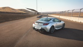 A rear view of the 2022 Subaru BRZ on a track