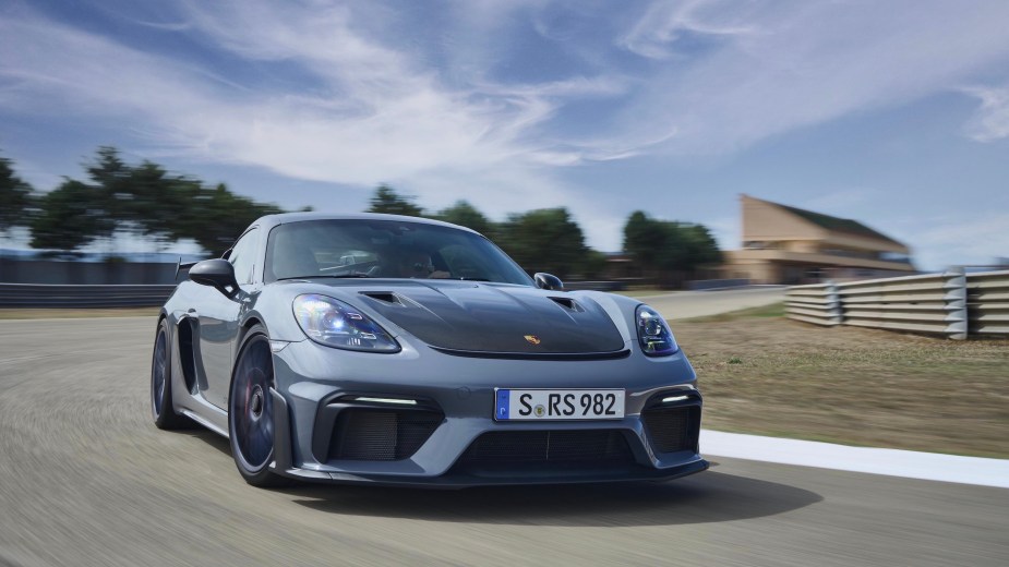 A 718 Cayman GT4 RS driving on the track