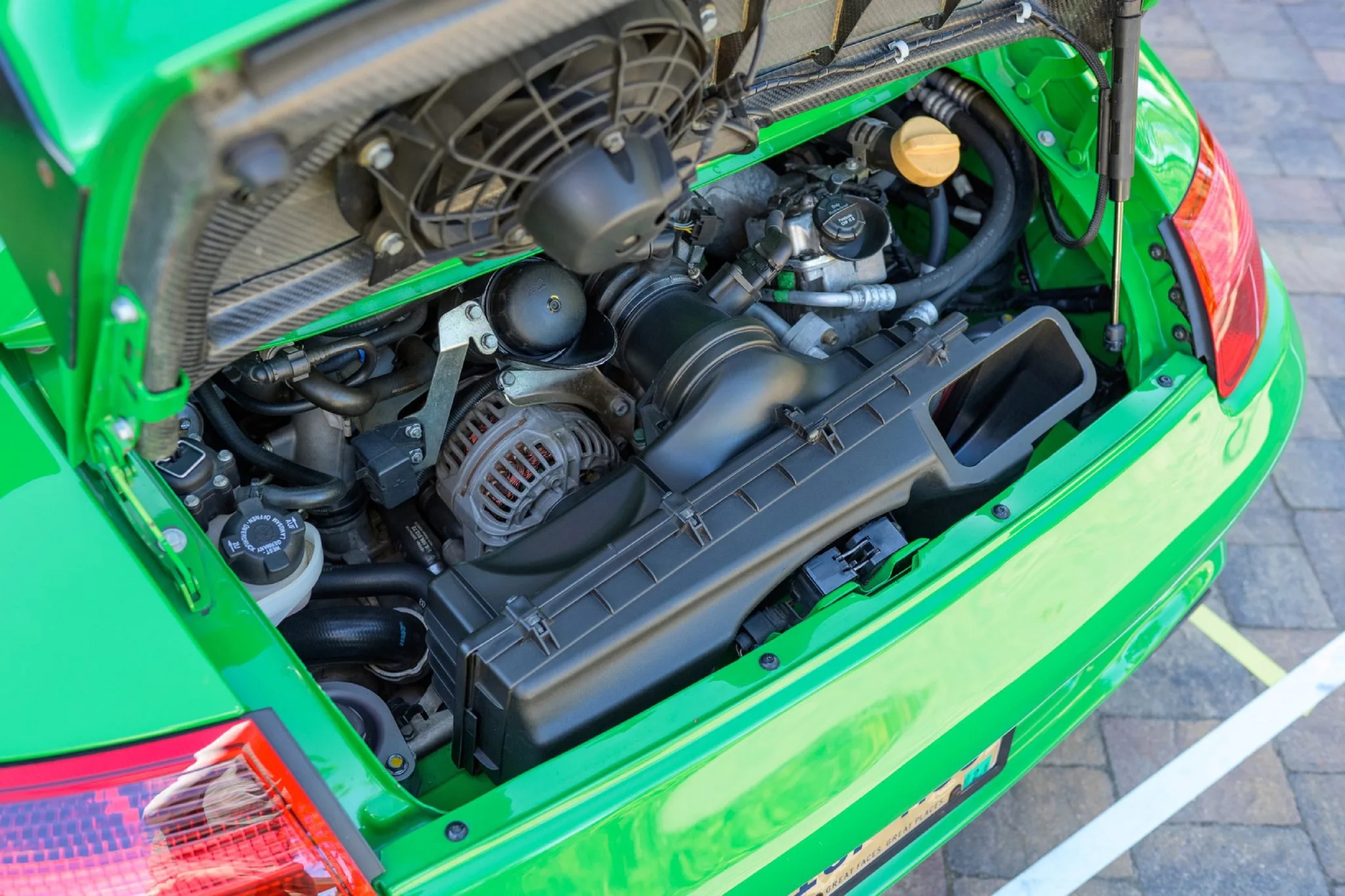 A Viper Green 2007 RUF RGT's engine bay with a Sharkwerks-modified 3.9-liter flat-six
