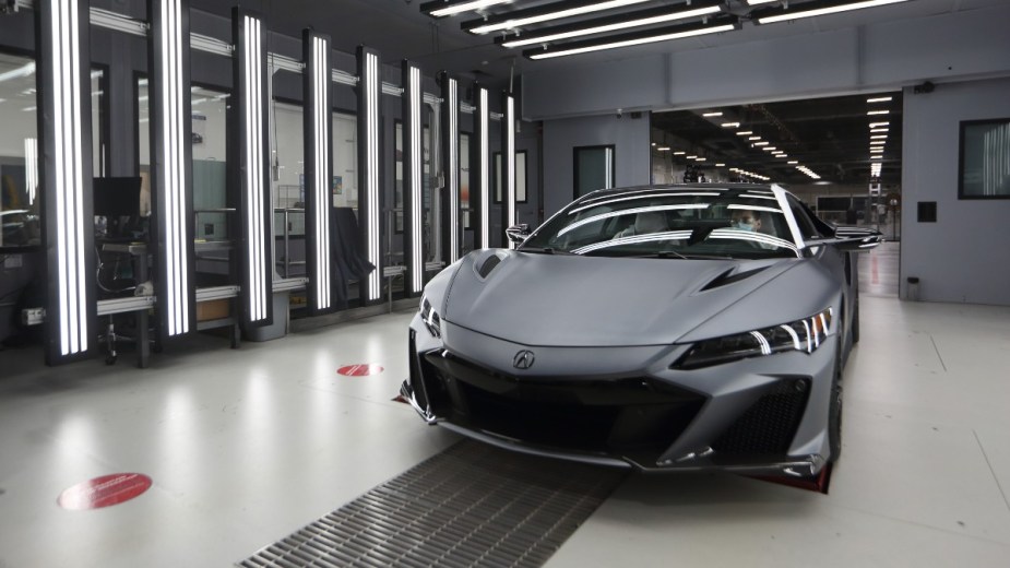 an acura nsx undergoes an inspection before rolling off the production line