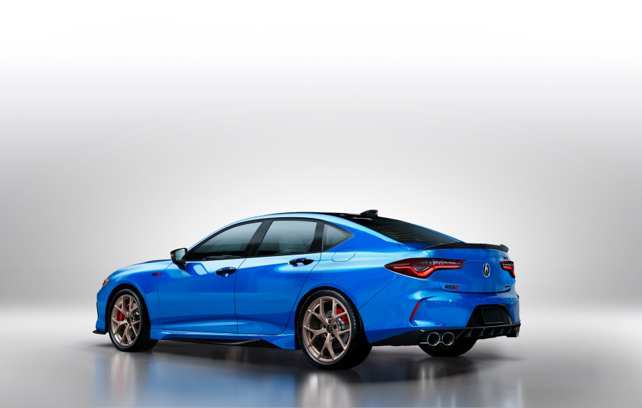 A blue Acura TLX Type S PMC Edition against a blank background