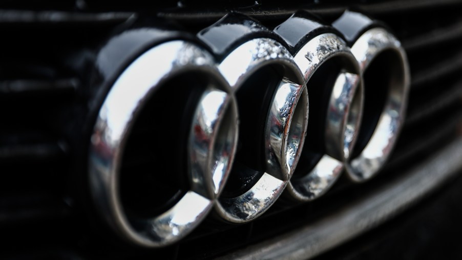 Audi, maker of the Audi charging stations and cars, logo on a black grille.