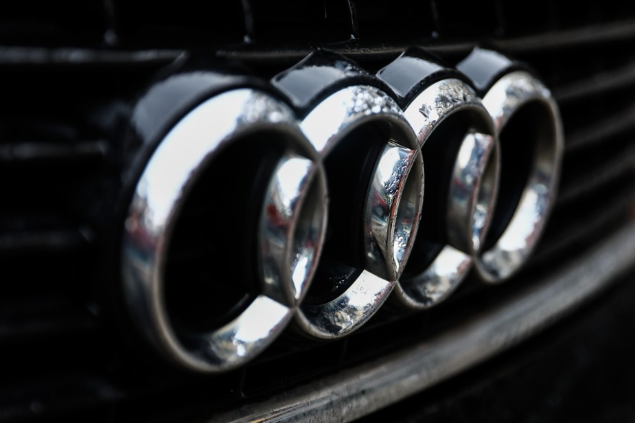 Audi, maker of the Audi charging stations and cars, logo on a black grille.