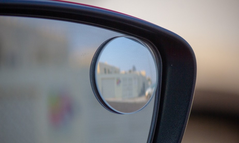 A Blind-Spot Mirror can be helpful, but not as good as the monitoring system