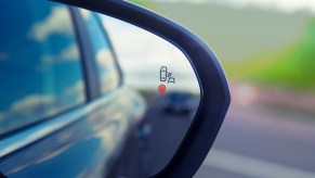 Blind-Spot Monitoring Warning Indicator alerts a driver to a vehicle in their blind area