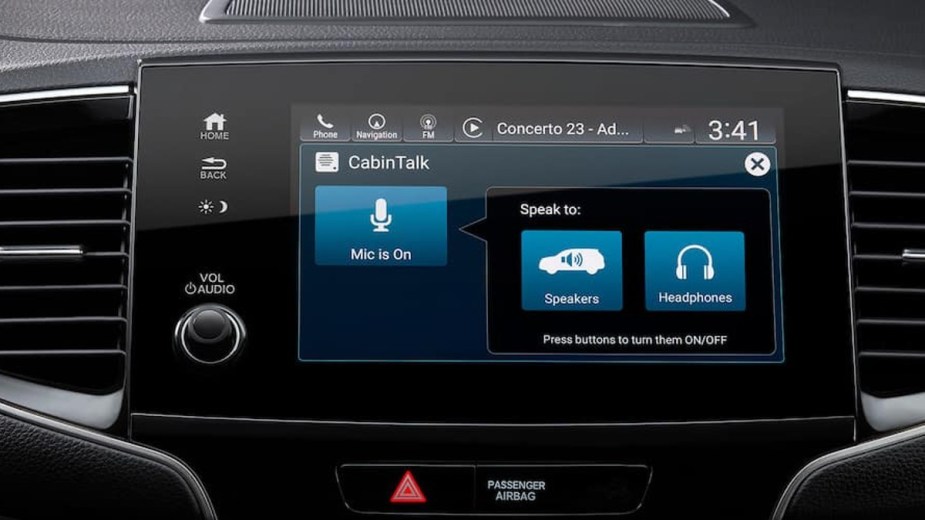 CabinTalk Screen in the Honda Pilot, this feature in the Pilot Elite SUV allows the driver to speak to rear passengers through the speakers