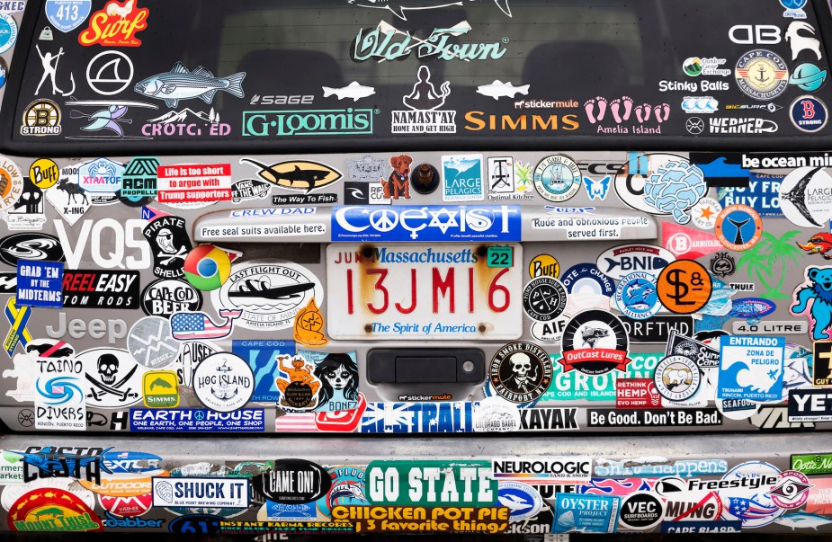 A group of bumper stickers on a car, which is a great gift ideas for car enthusiasts.