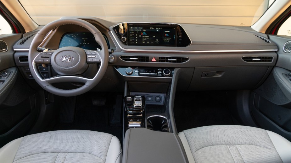 Dashboard and front seats in 2023 Hyundai Sonata midsize sedan, highlighting its release date and price