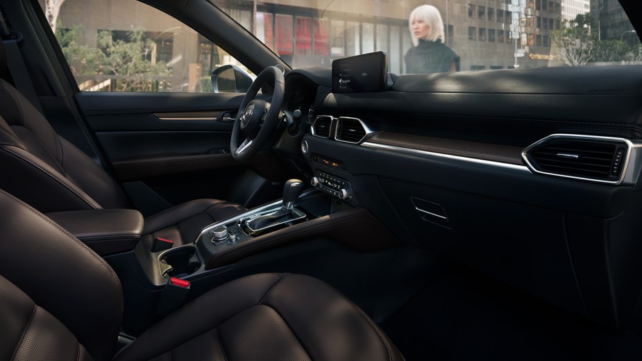 Dashboard and front seats of the 2023 Mazda CX-5, highlighting its release date and price