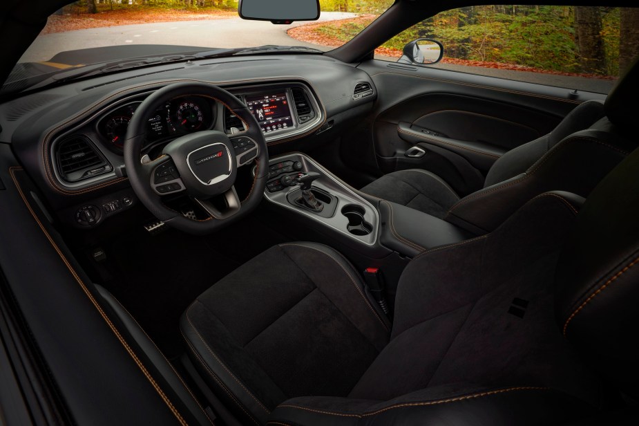 The Dodge Challenger's interior is a practical cockpit for modern muscle car drivers.