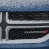 The Dodge logo covered in snow seen in Edmonton, Alberta, Canada