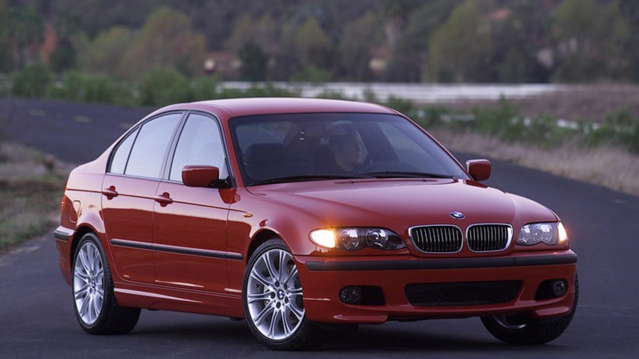 A red E46 BMW 330i ZHP on a desert road