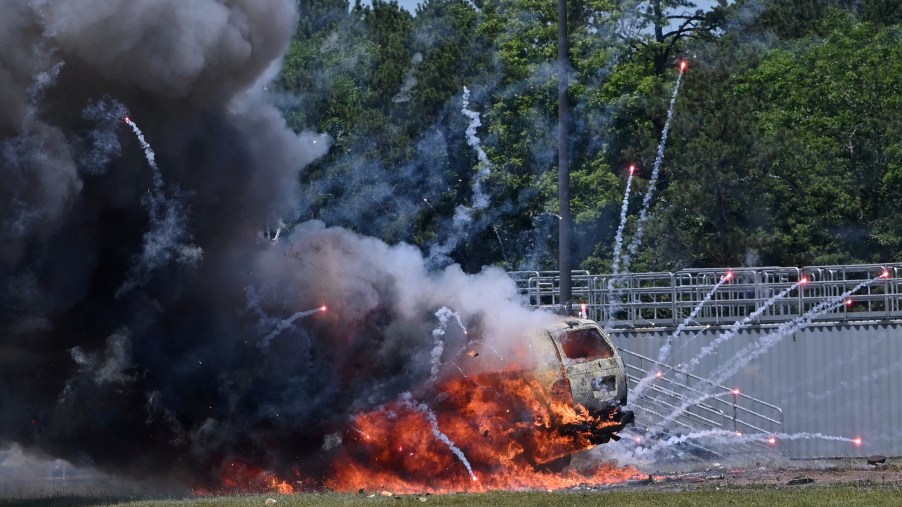 Firefighters deliberately set off illegal Fourth of July fireworks in a car on a track