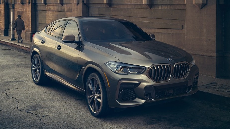 Front angle view of gray 2023 BMW X6 luxury SUV, highlighting its release date and price