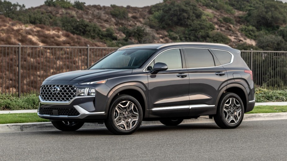 Front angle view of gray 2023 Hyundai Santa Fe crossover SUV, highlighting its release date and price