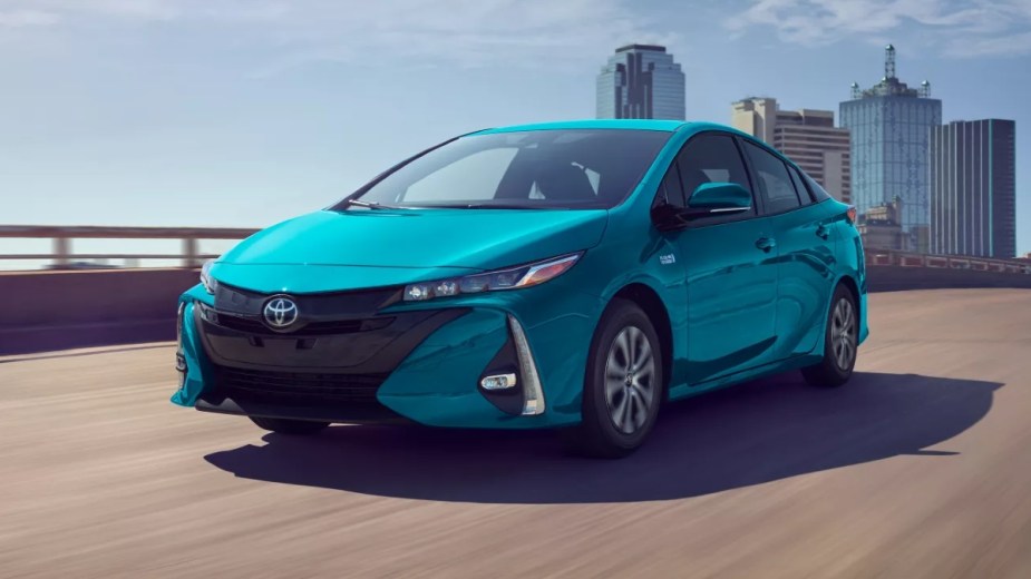 Front angle view of turquoise 2022 Toyota Prius Prime, the best Toyota hybrid to save money on gas