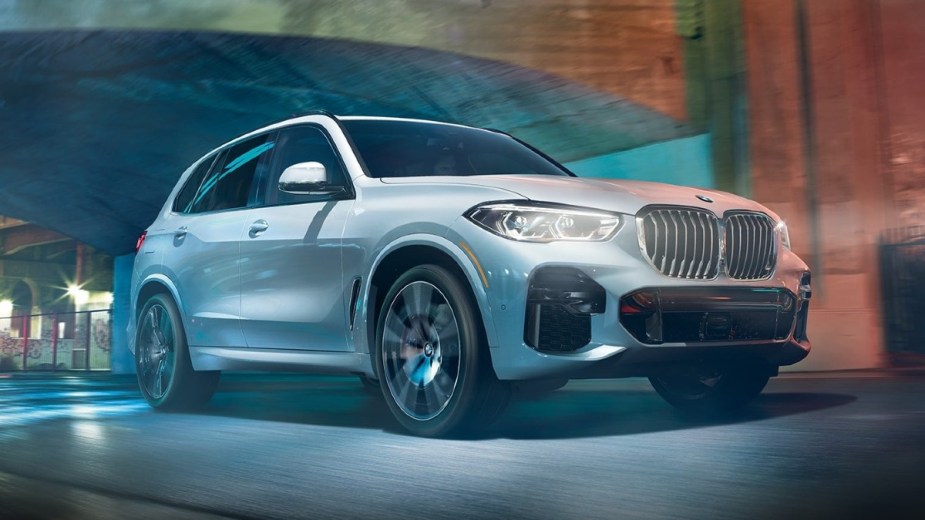 Front angle view of white 2023 BMW X5 that can be ordered with a third row. 