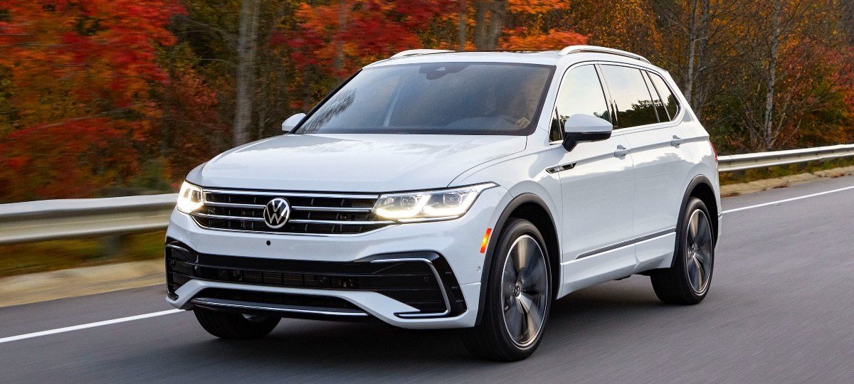Front angle view of white 2023 Volkswagen Tiguan crossover SUV, highlighting its release date and price