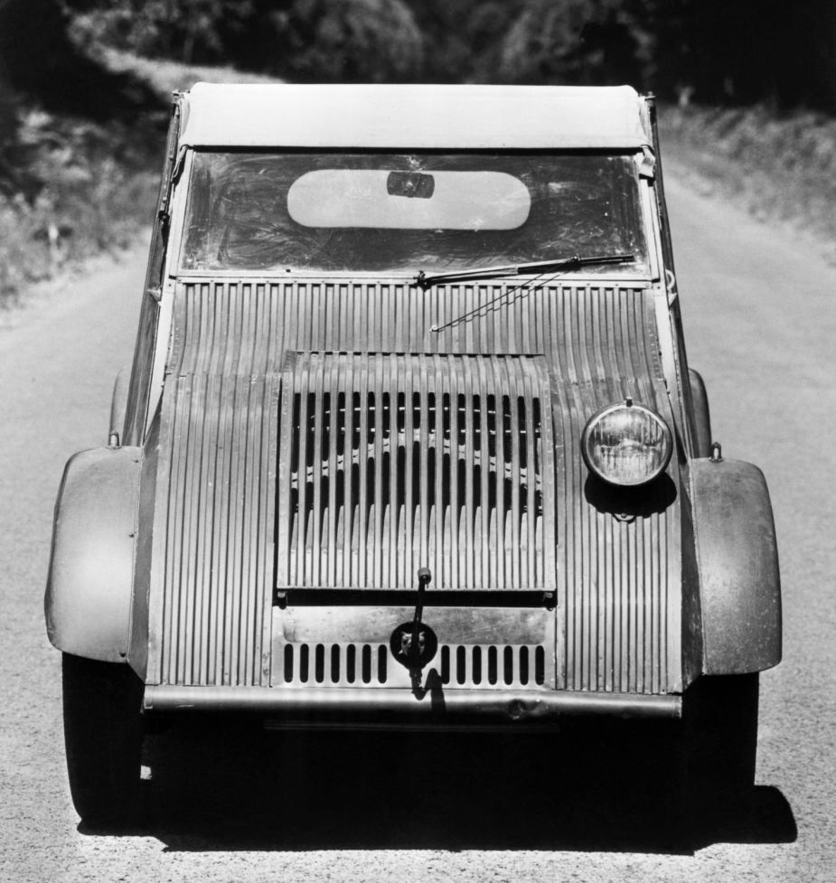 Front view of 1939 Citroen 2CV prototype with one headlight, highlighting reasons why cars now have two headlights