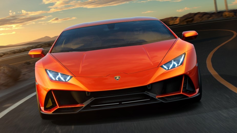 Front view of orange Lamborghini Huracán EVO, a modern car with an angry and mean face