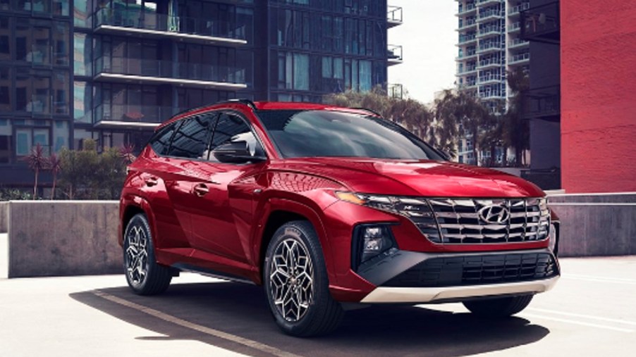 A red 2022 Hyundai Tucson N Line compact SUV is parked.