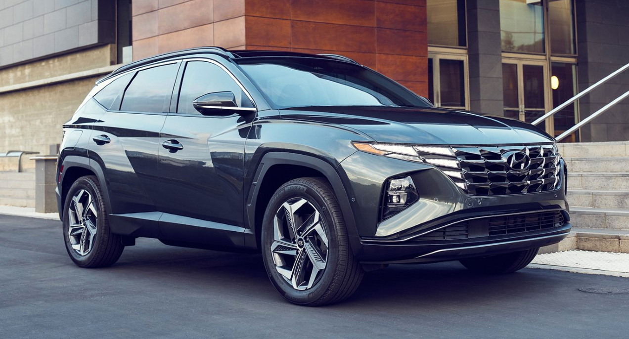 A gray 2022 Hyundai Tucson Plug-In Hybrid compact SUV is parked.