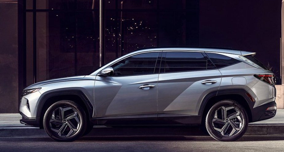 A gray 2022 Hyundai Tucson compact SUV is parked. 