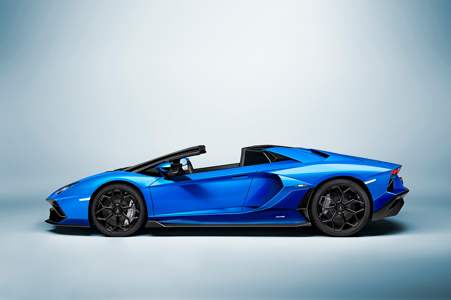 Blue 2022 Lamborghini Aventador Ultimae Roadster side profile