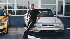 Rapper Ludacris with his 1993 Acura Legend at Acura facility in LA after restoration