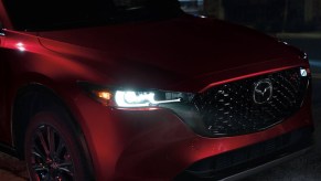 The front of a red 2022 Mazda CX-5 compact SUV.