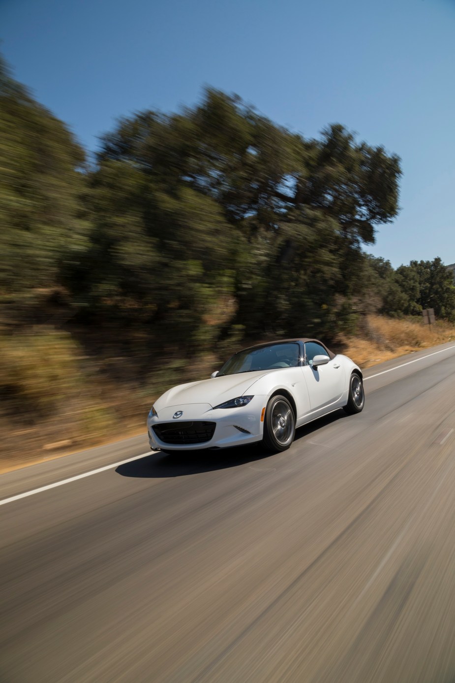 The 2022 Mazda MX-5 tops the list of the most fuel-efficient cars with fun, quick qualities.