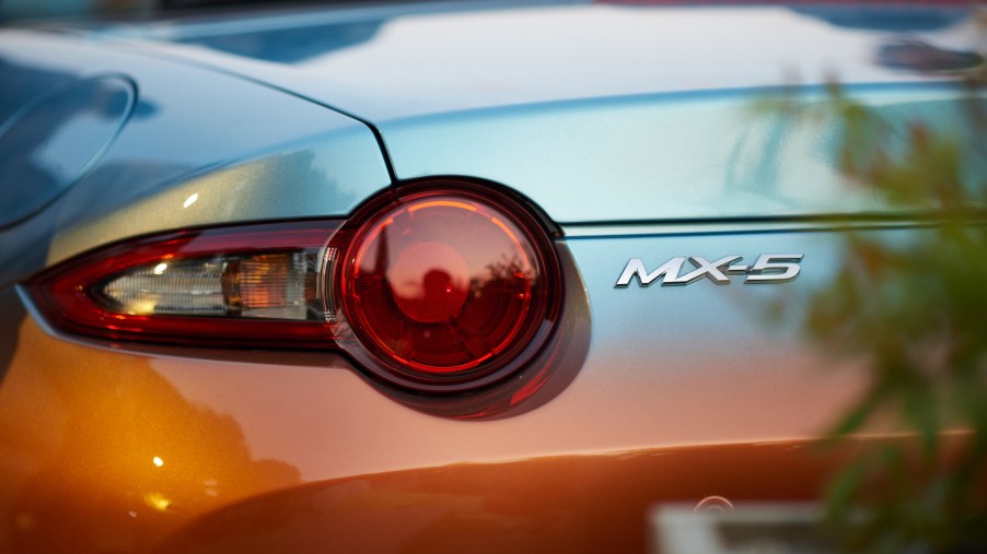 Mazda Miata (MX-5) logo, maker of the most practical Miata, on the back of the car.