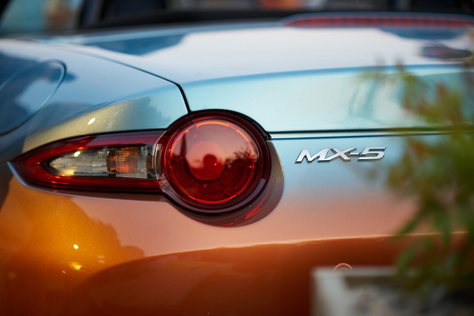 Mazda Miata (MX-5) logo, maker of the most practical Miata, on the back of the car. 