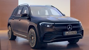 A blue 2023 Mercedes-Benz EQB luxury compact SUV is parked.