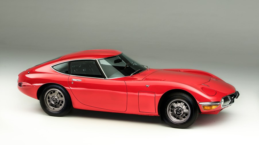 Gorgeous old 1969 Toyota 2000GT sports car in Solar Red shot from JDM driver's side
