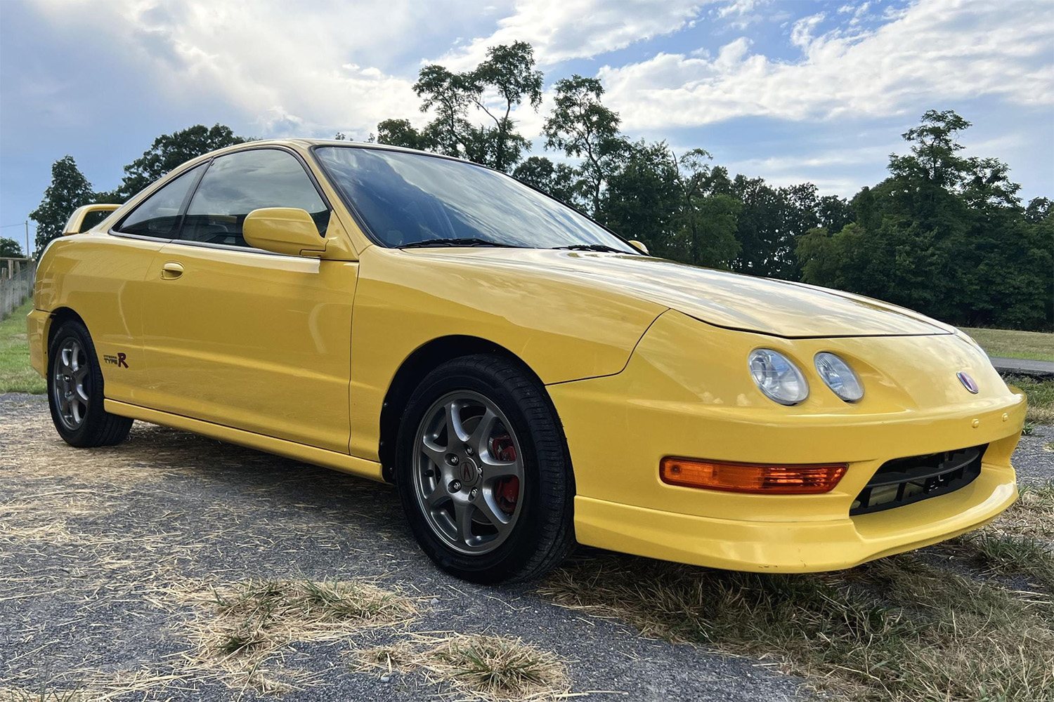 Phoenix Yellow Integra Type R front 3/4 photoshoot Cars and Bids 