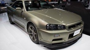 R34 Nissan Skyline M Spec Nur Show and Display Legal Millenium Jade parked at Tokyo Auto Salon