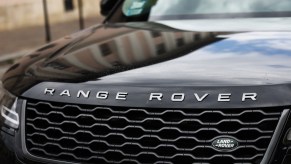 Range Rover logo on hood of car, potentially a 2023 land Rover Discovery.