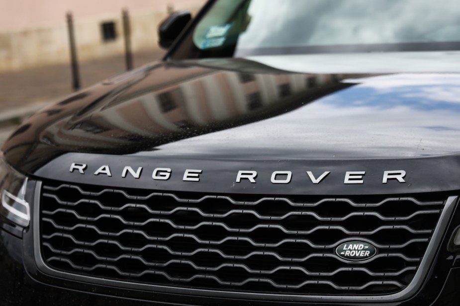 Range Rover logo on hood of car, potentially a 2023 land Rover Discovery.