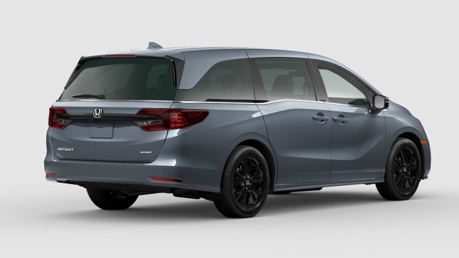 Rear angle view of gray 2023 Honda Odyssey