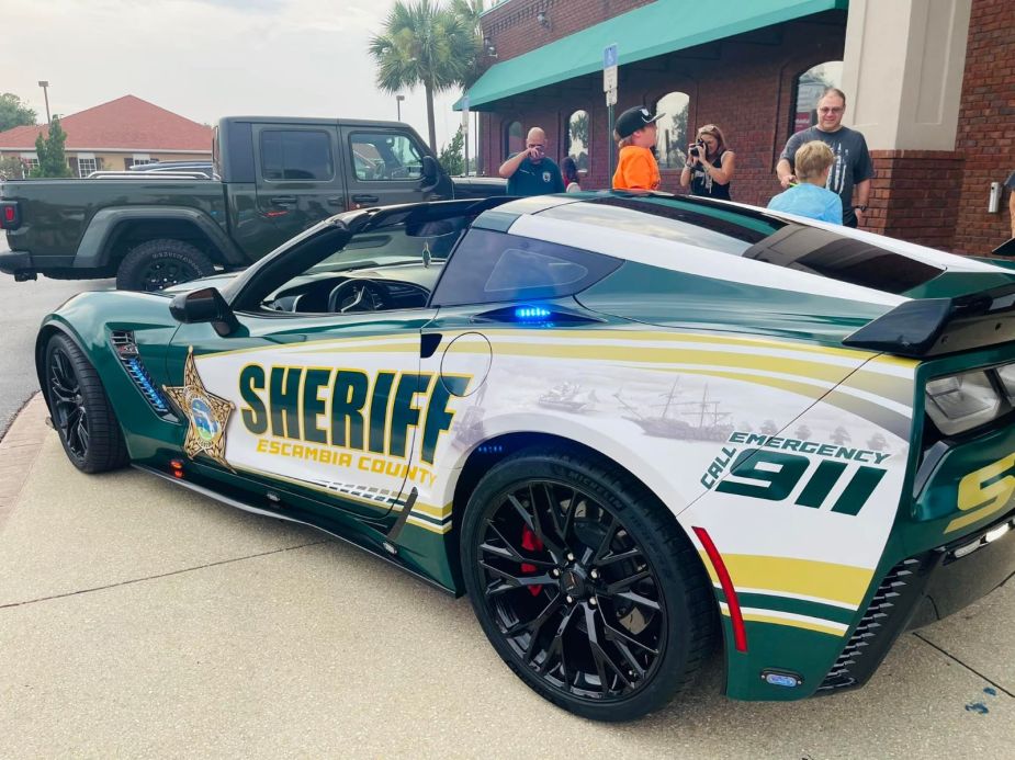 Rear angle view of a seized 2017 Chevy Corvette Z06 wrapped in police decals