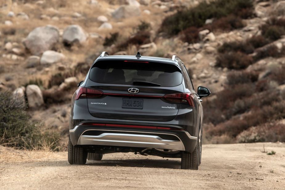 Rear view of gray 2023 Hyundai Santa Fe crossover SUV, highlighting its release date and price