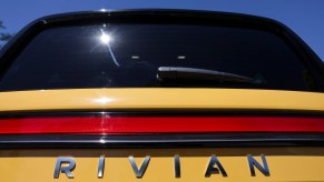 A yellow Rivian back end, that potentially has the pet mode.