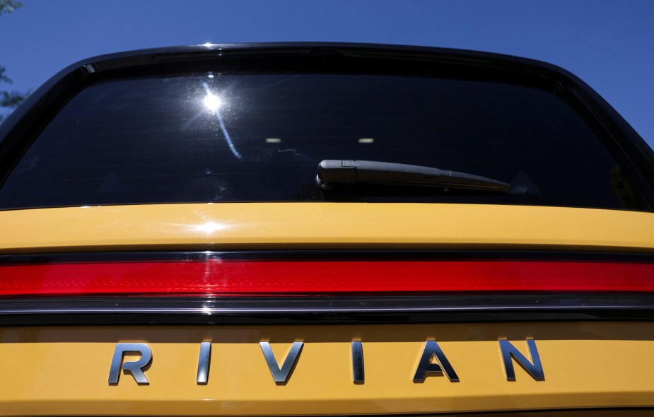 A yellow Rivian back end, that potentially has the pet mode. 