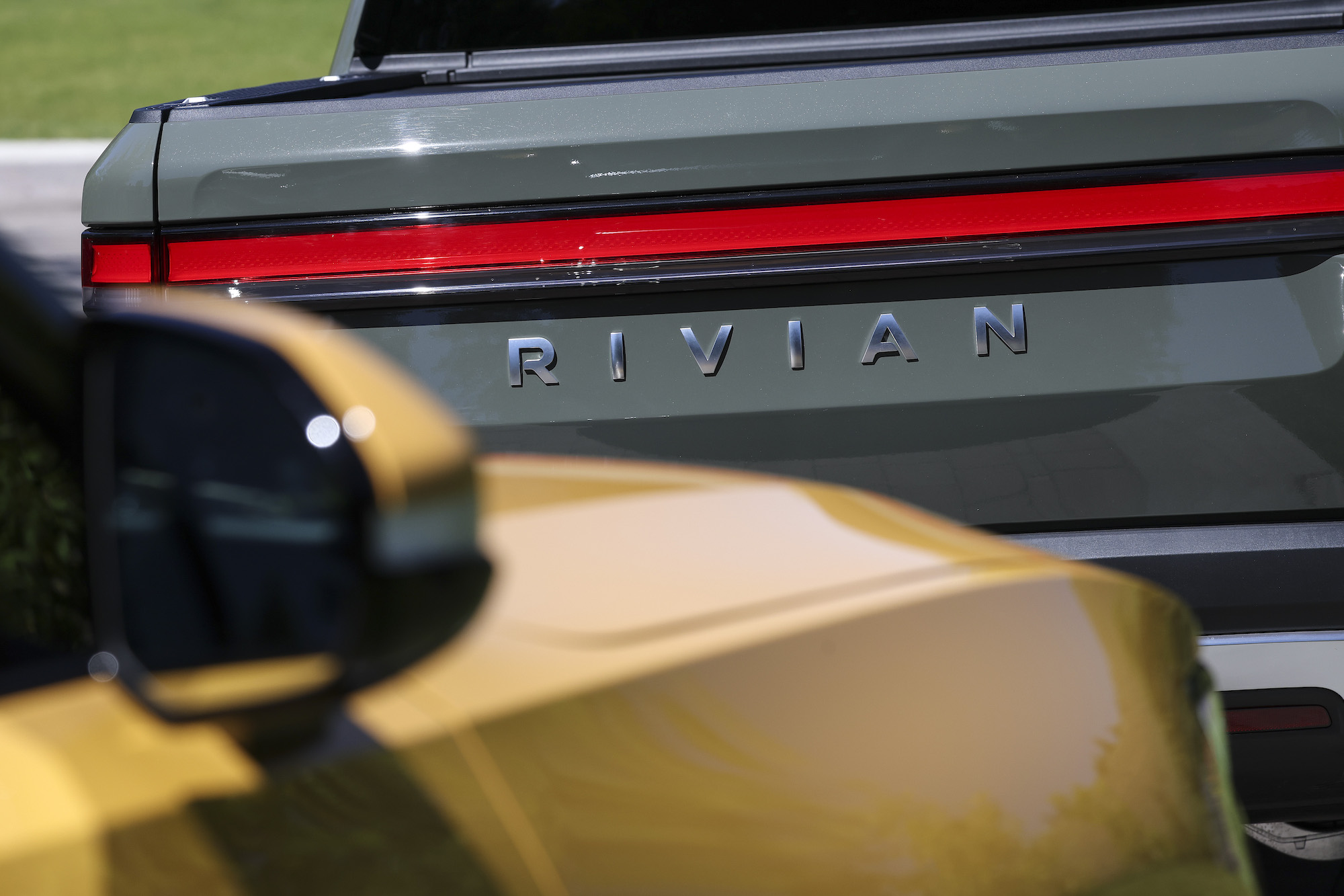 Rivian logo, potentially maker of an e-bike, on the back of the truck.