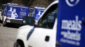 Tesla Todd does Meals on Wheels in his Tesla Model 3, who's trucks are pictured here