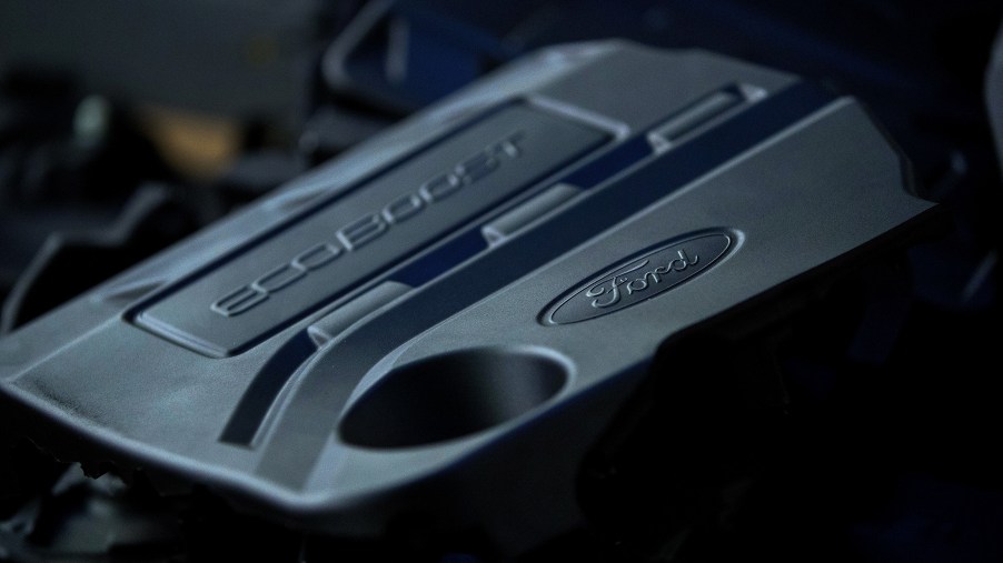 The black cover of a Ford EcoBoost engine with direct and port fuel injection