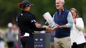 Volvo CEO Jim Rowan presenting a trophy to Linn Grant during the Volvo Scandinavian Mixed in Halmstad, Sweden