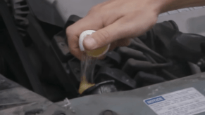 Putting a raw egg into a radiator with a leak.