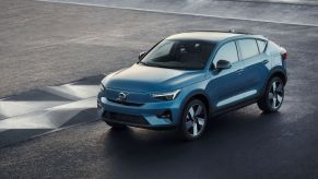 A shiny blue 2022 Volvo C40 Recharge electric SUV model